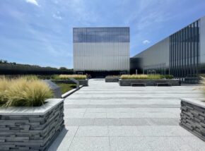 SOM's Arm Museum's rooftop Medal of Honor Garden against a blue sky with clouds