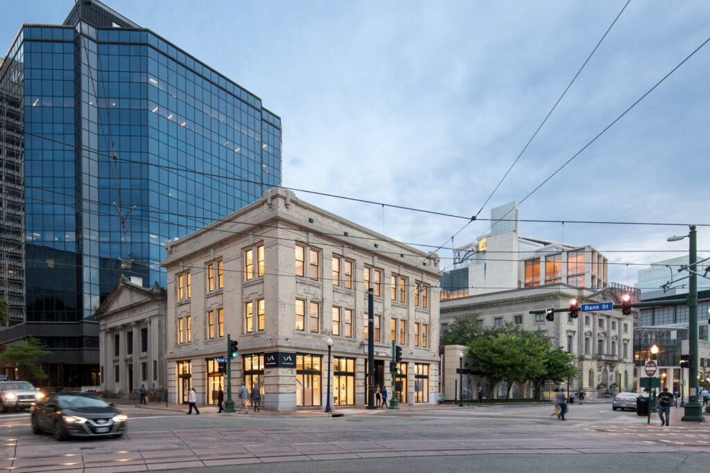Historic Photo of the Essex Building at theCorner of Bank and Plume Corner of Bank + Plume at Dusk