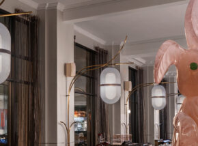 pink glass rabbit in a hotel lobby