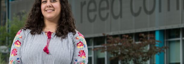 Architect Jenine Kotob standing in front of a building